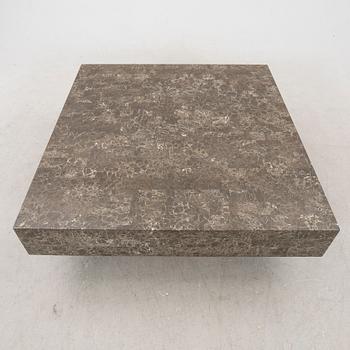 A late 20th century travertine coffee table.
