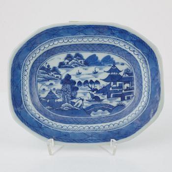 A blue and white tureen with cover, a plate and a butter tureen with cover and stand, China, 18th and 19th century.