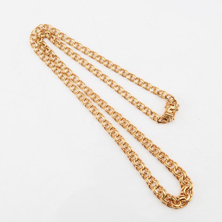 Necklace with a graduated Bismarck link in 18K gold.