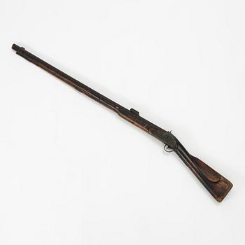 A 19th century percussion rifle.