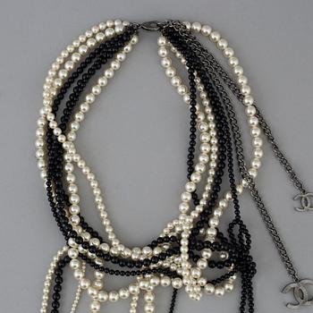 A necklace by Chanel, 2014.