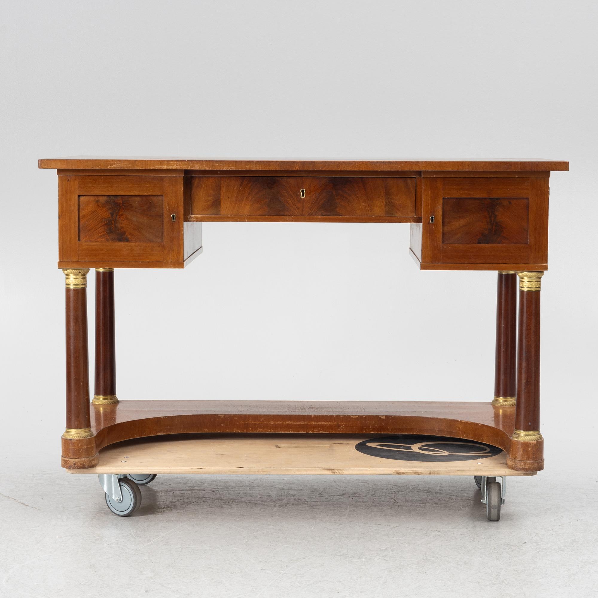 An Empire style desk, first half of the 20th Century.