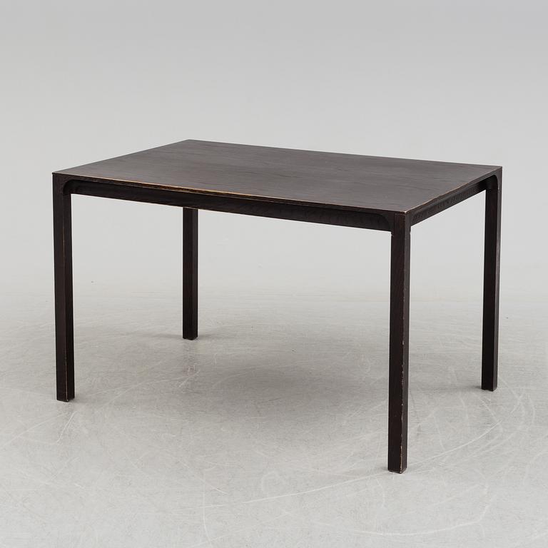 An 'Arc' oak dining table by Claesson Koivosto Rune.