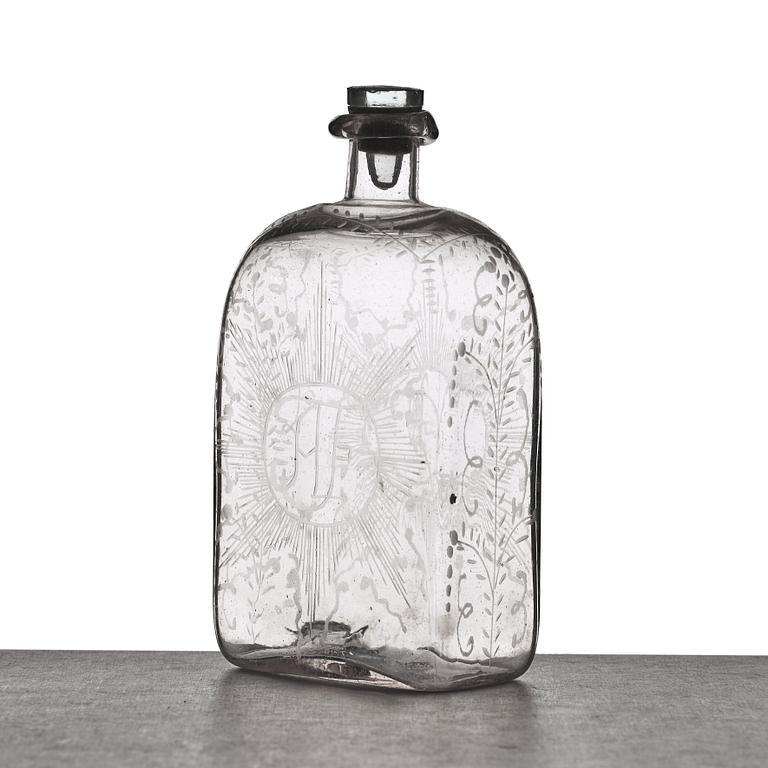 A glass bottle, 18th Century.