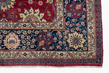 A fine Meshed carpet of 'Vase' design, North-East Persia, c. 480 x 345 cm.