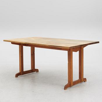 A Mid 20th Century Pinewood Dining Table.