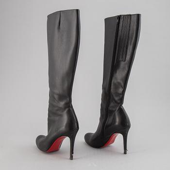 CHRISTIAN LOUBOUTIN, a pair of leather boots, size 37.