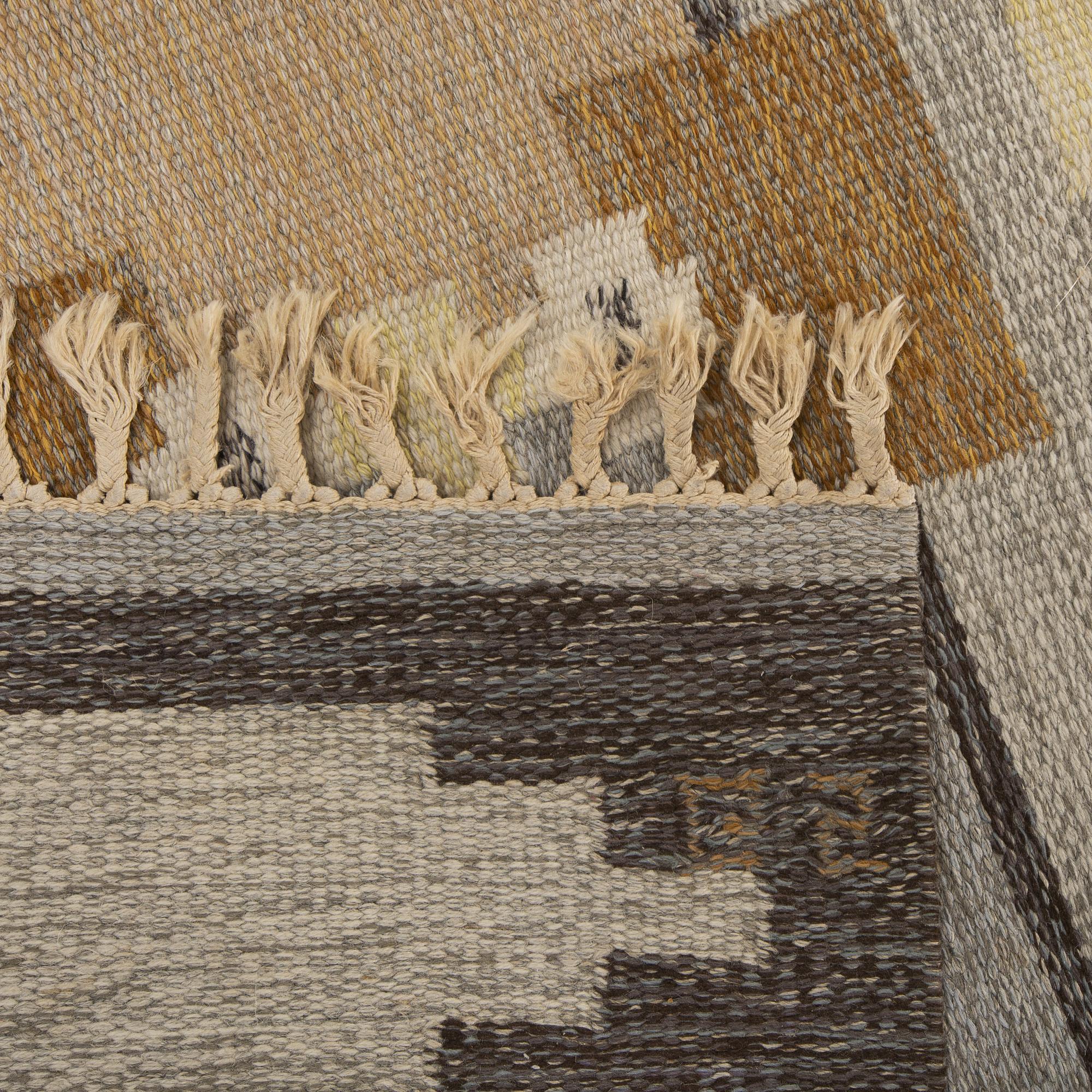 A signed flat weave carpet 220x160 cm.
