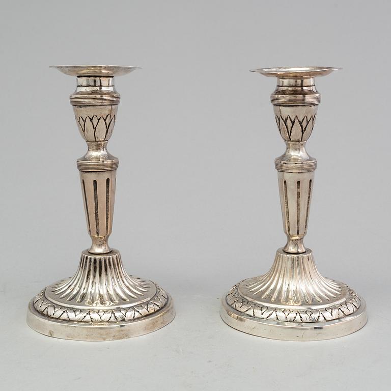 A pair of late 18th century silver candlesticks with unclear hallmarks, possibly from Germany. Weight ca 316 grams.