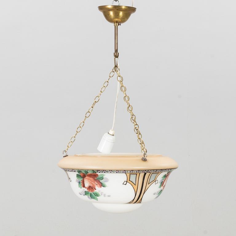 An early 1900's painted glass pendant.