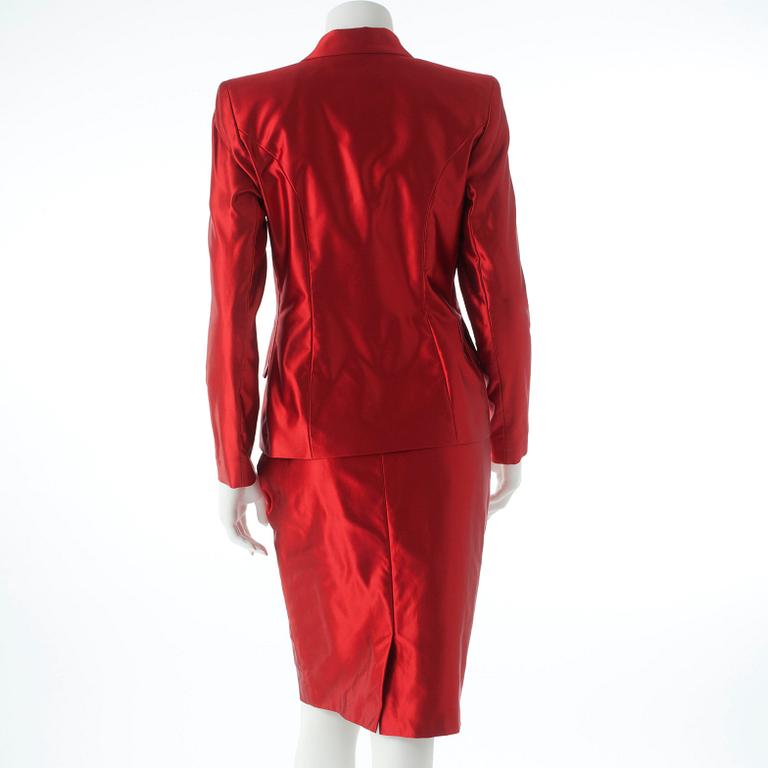 YVES SAINT LAURENT, a two-piece silk suit consisting of jacket and skirt.