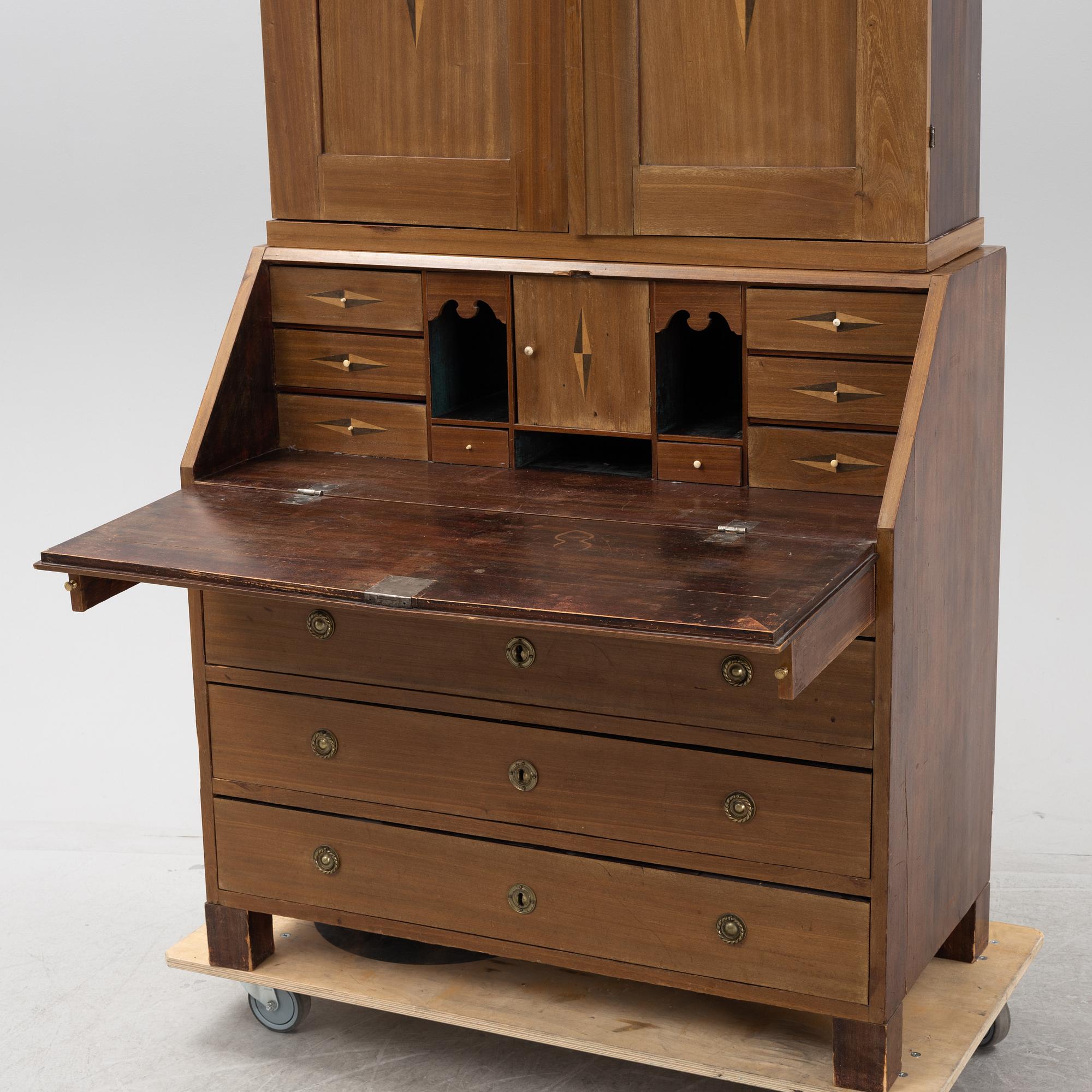 A mahogany-veneered Empire cabinet, first part of the 19th Century.