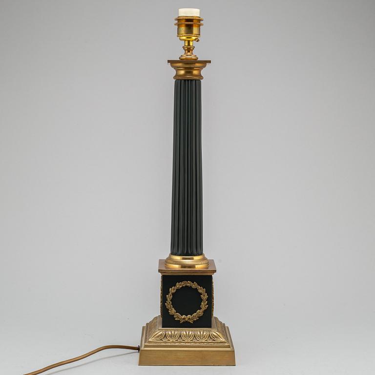 A modern Empire-style table lamp.