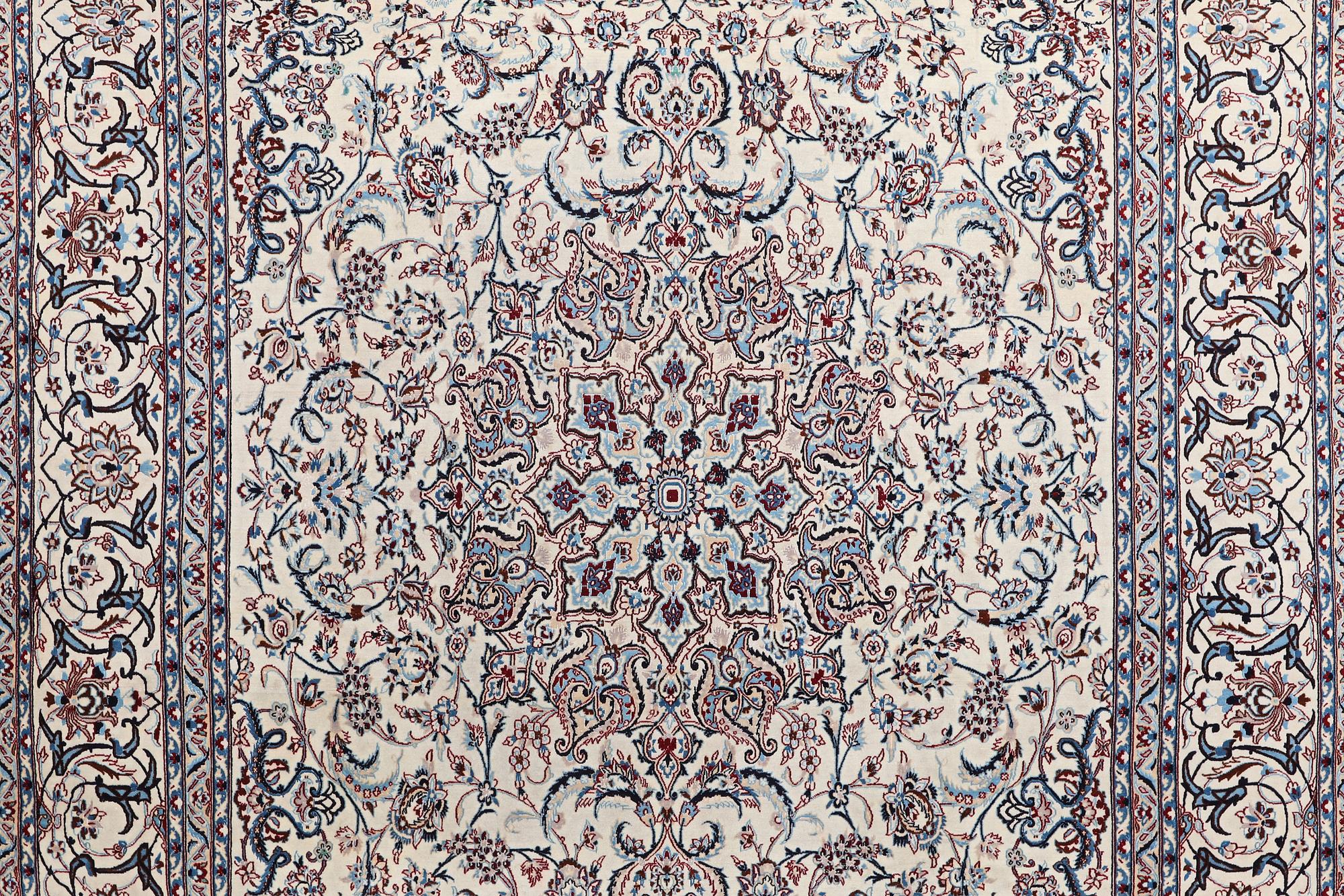 A carpet, Nain, part silk, ca 426 x 309 cm.