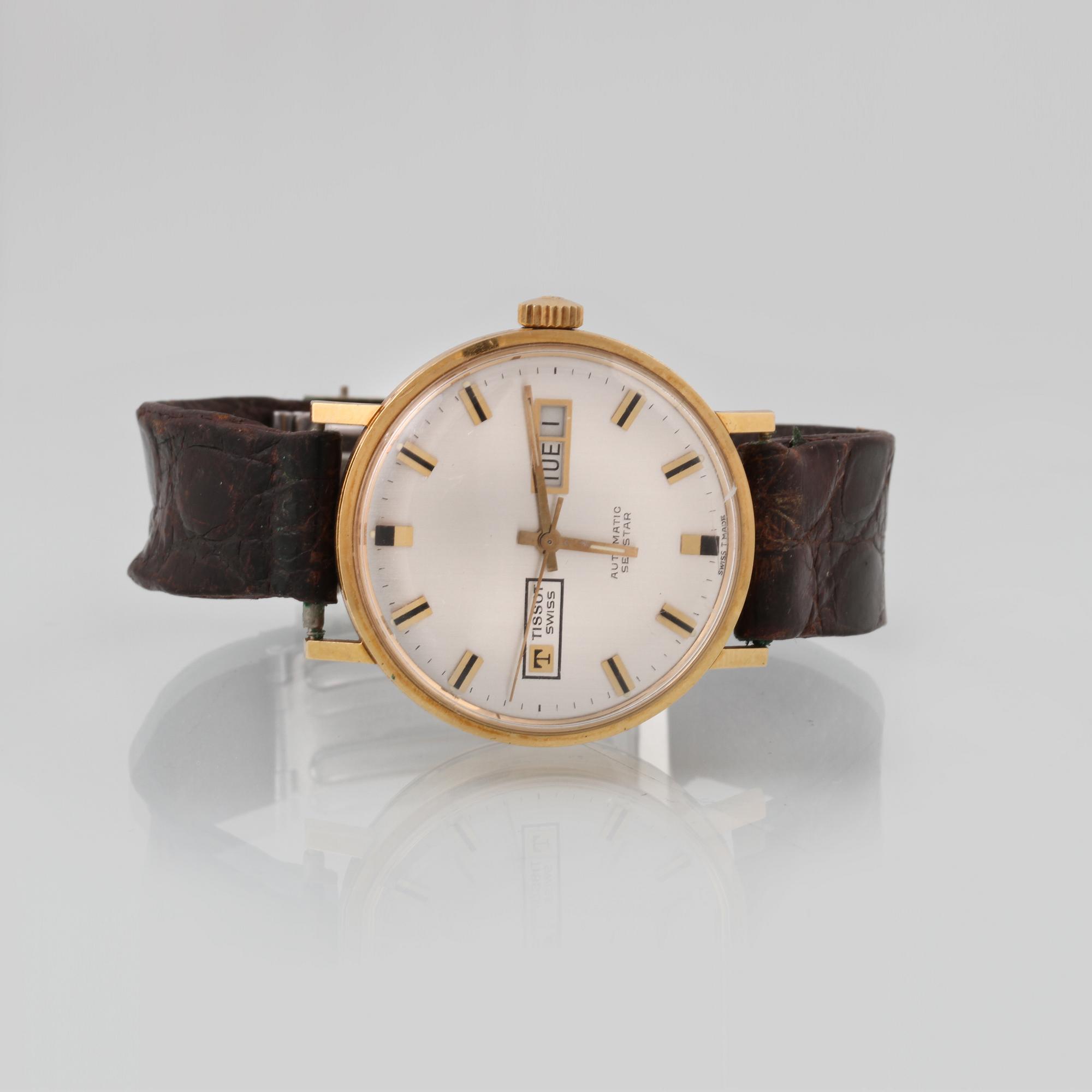 ARMBANDSUR, 18 k guld, Tissot, "seastar".