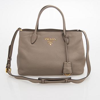 Prada, a clay gray leather handbag, 2020.
