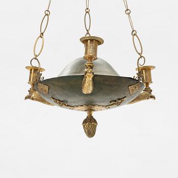 A Swedish Empire three-light gilt brass and tole hanging-light, early 19th century.