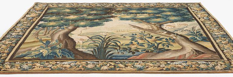 A Flemish 'verdur' tapestry, c. 283 x 290 cm, around 1700.