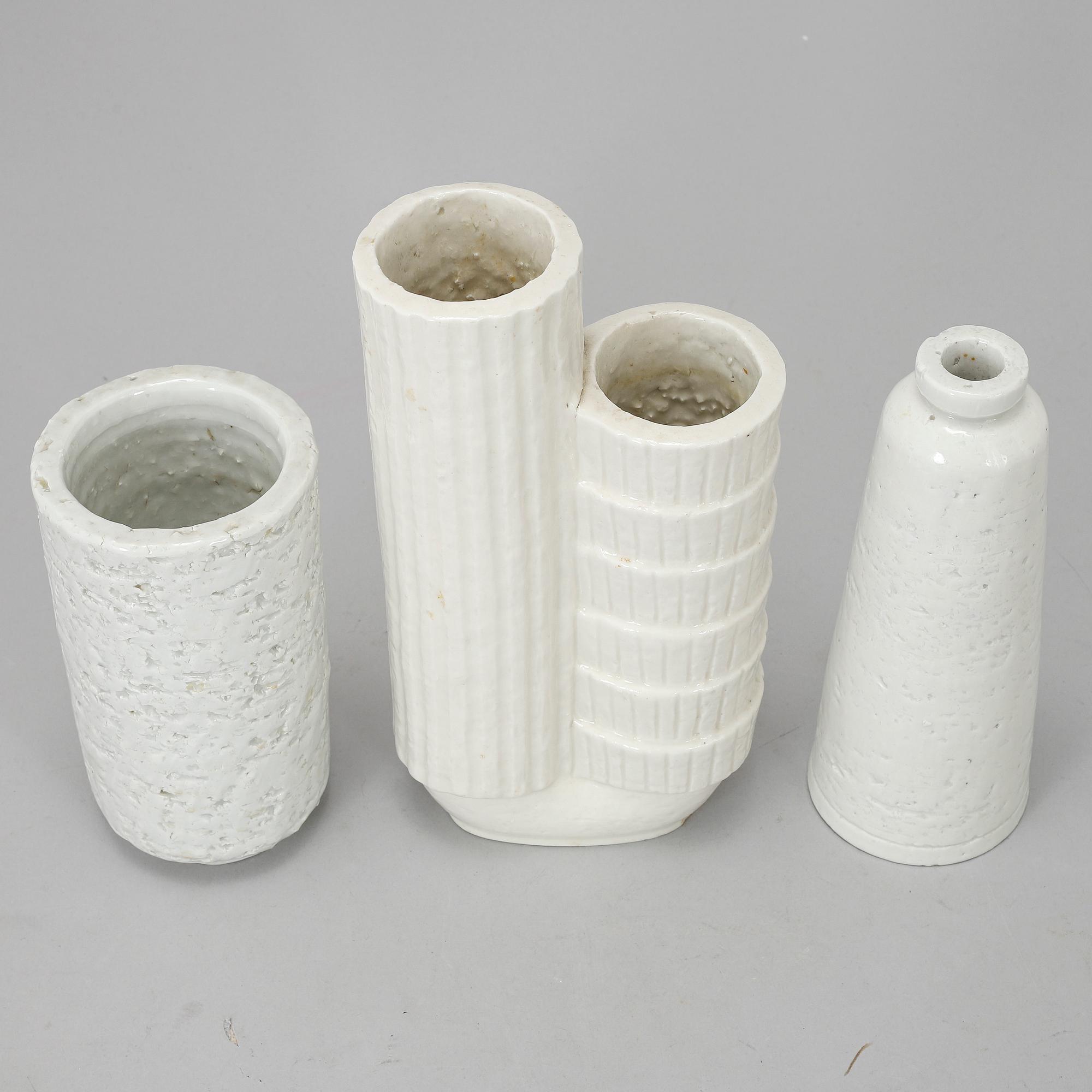 GUNNAR NYLUND, a set of three chamotte vases, Rörstrand.