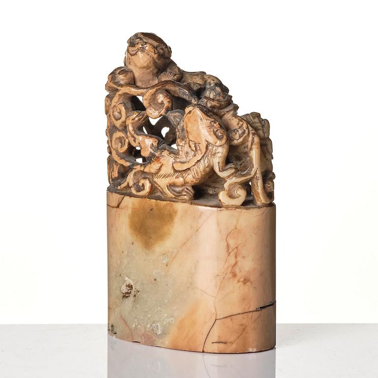 Two seal stamps, soapstone and blanc de chine. Qing dynasty 18th/19th century.