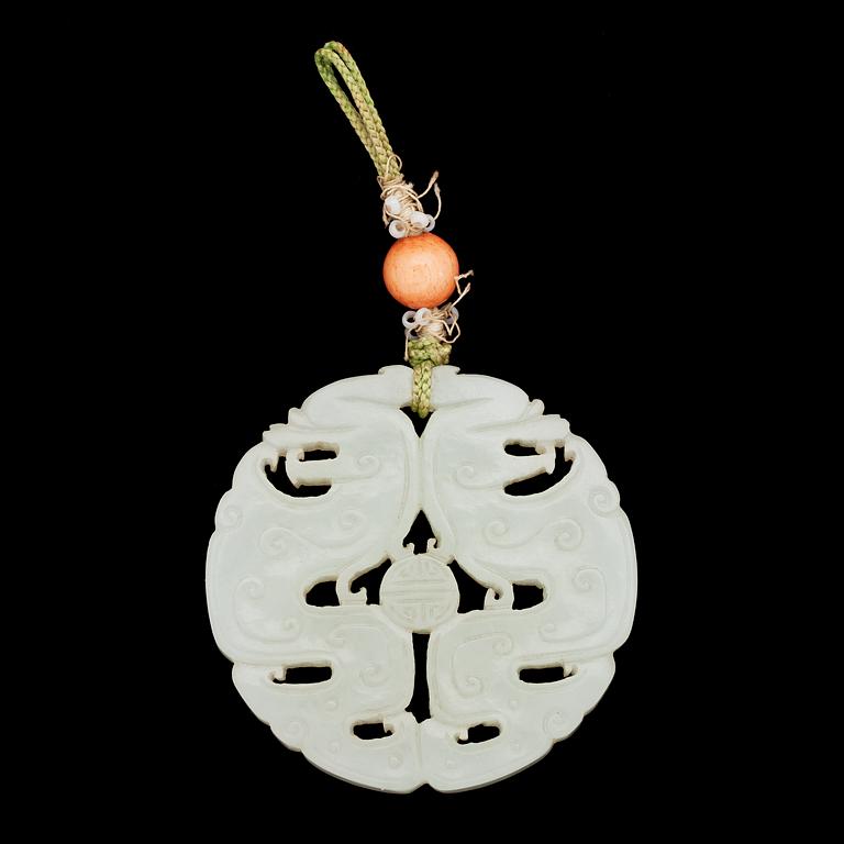 A jade pendant, early 20th century.