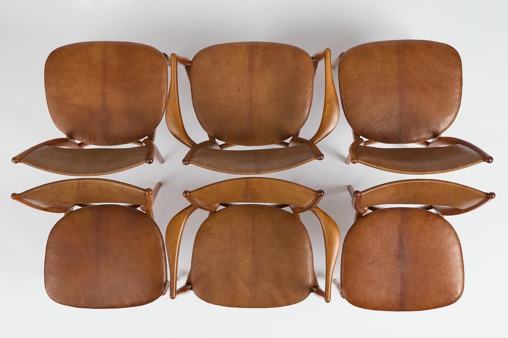 Finn Juhl, a set of four chairs and a pair of armchairs, model "Bo-63" and "Bo-72", Bovirke, Denmark, 1950s-60s.