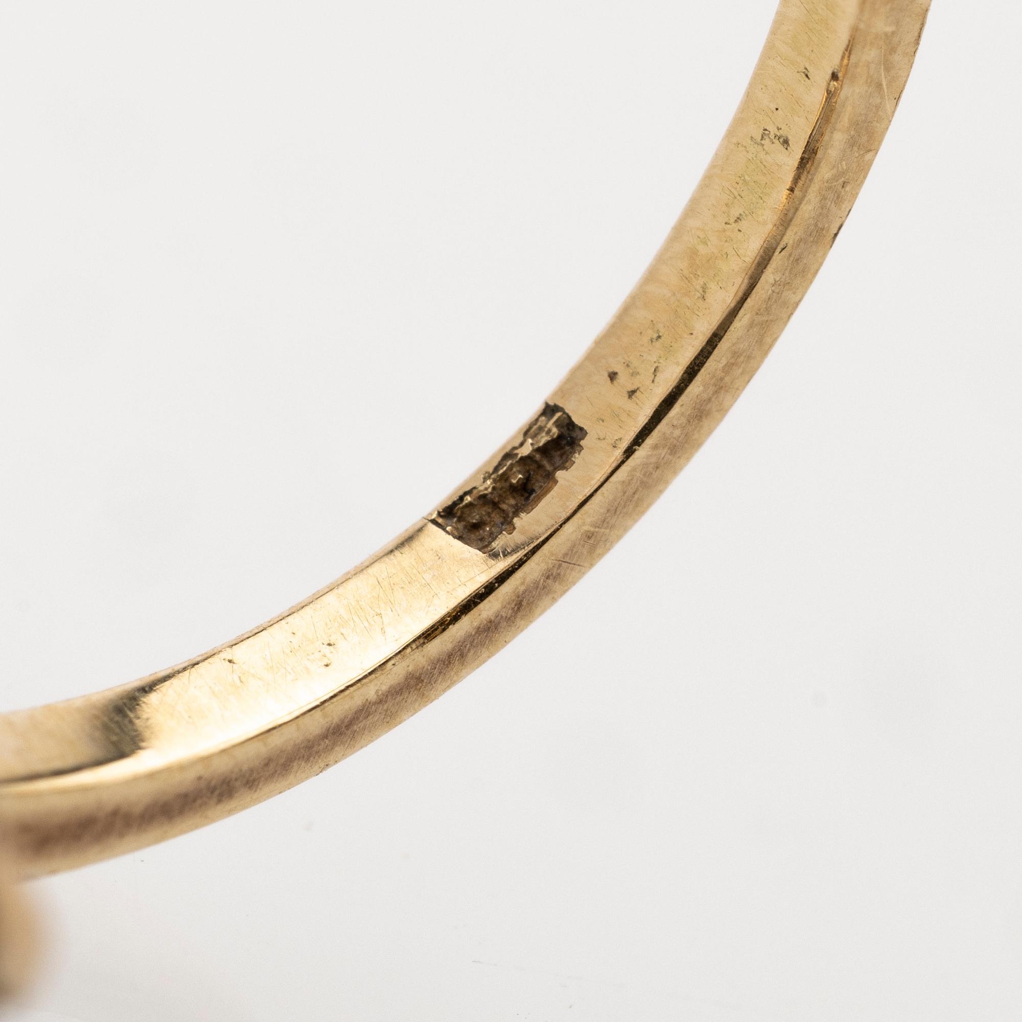 Ring Art Déco av 14K guld och platina med diamanter.
