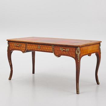 A Louis XV-style bureau plat desk, early 20th century.