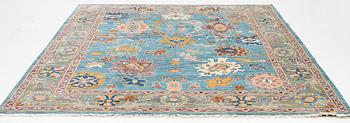 A Heriz design carpet, c. 301 x 240 cm.