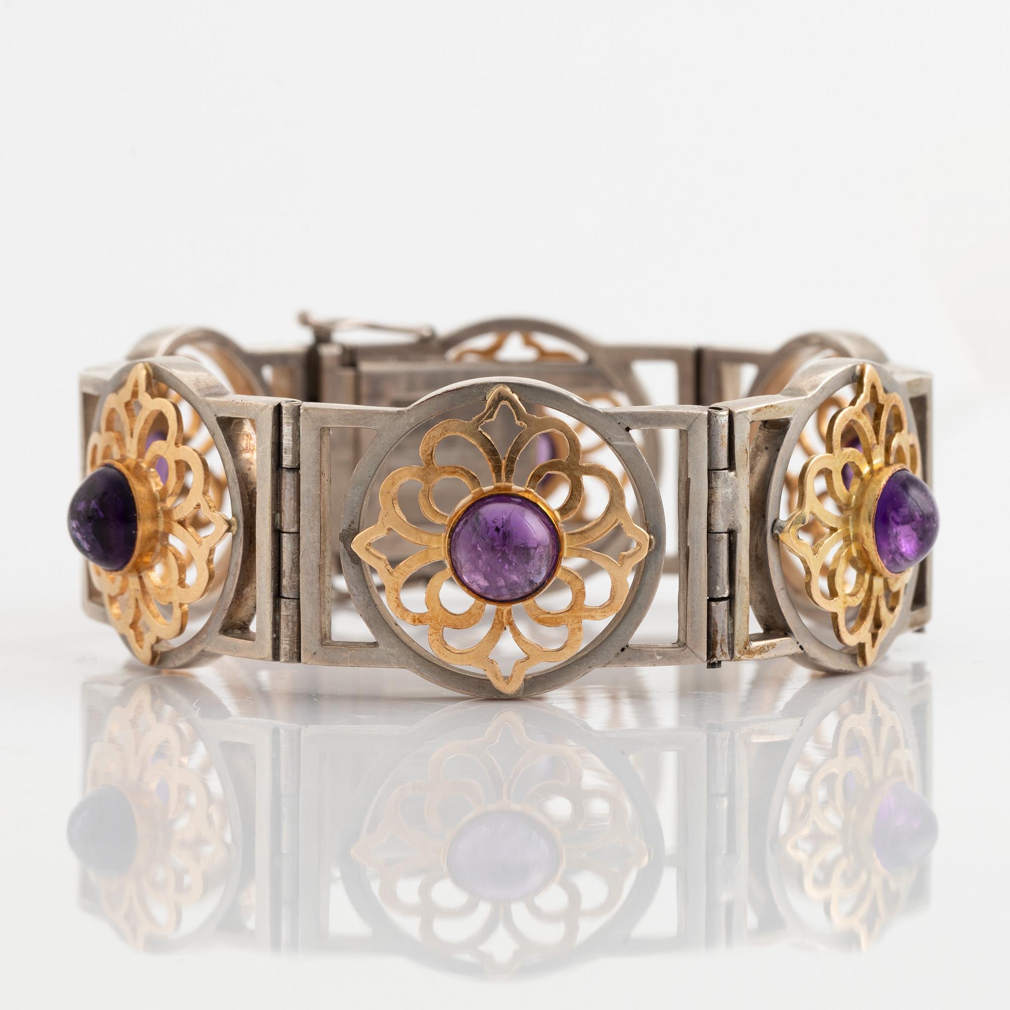 Silver and 18K gold with cabochon cut amethyst necklace.