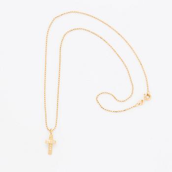 Efva Attling, 18K gold and brilliant-cut diamond cross pendant.