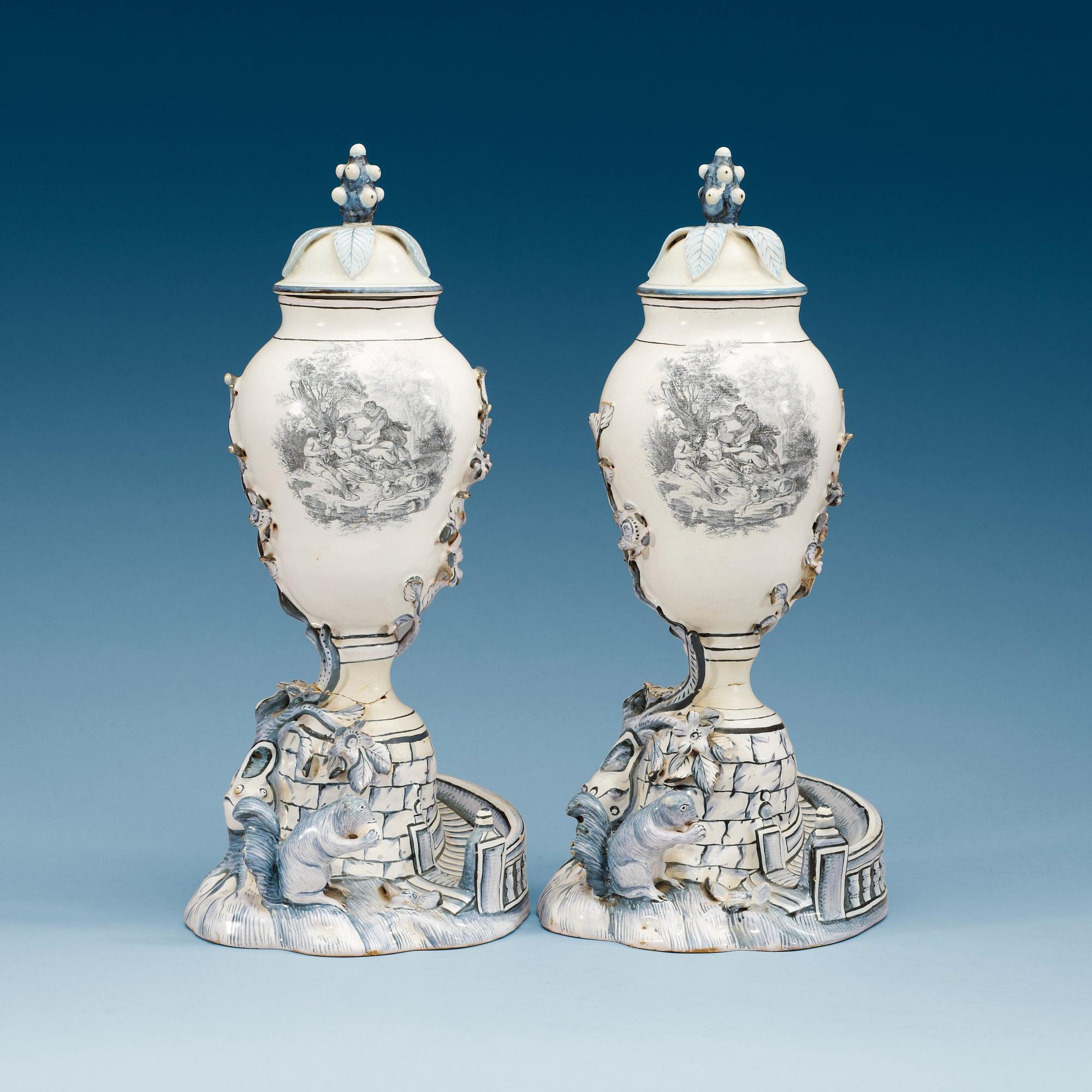 A pair of Swedish Marieberg faience vases with covers, 18th Century.