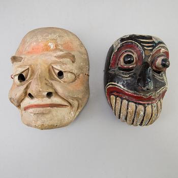 A group of dancing maskes, mostly Japanese Bugagku masks, Meiji period (1868-1912).