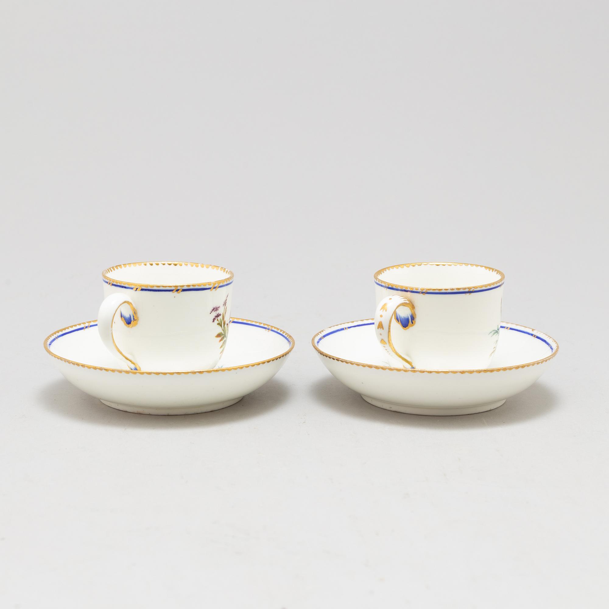 A pair of cups and saucers, "Sévrès"like mark, 19th century.