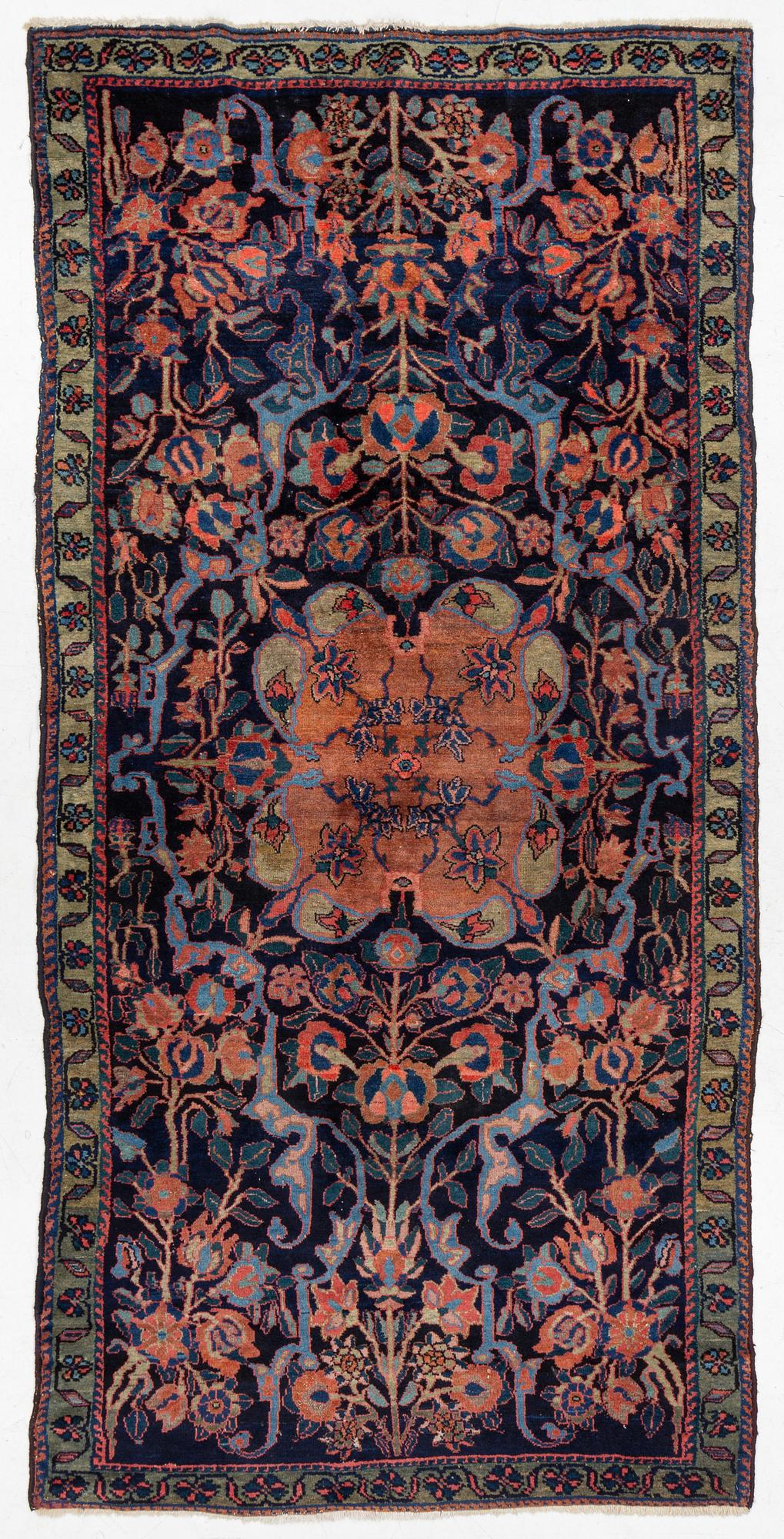 An antique Hamadan, c. 315 x 155 cm.