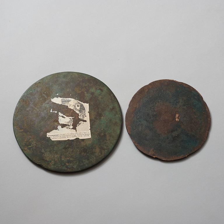 Two bronze mirrors, Six dynasties (220-589) and Tang dynasty (618-907).