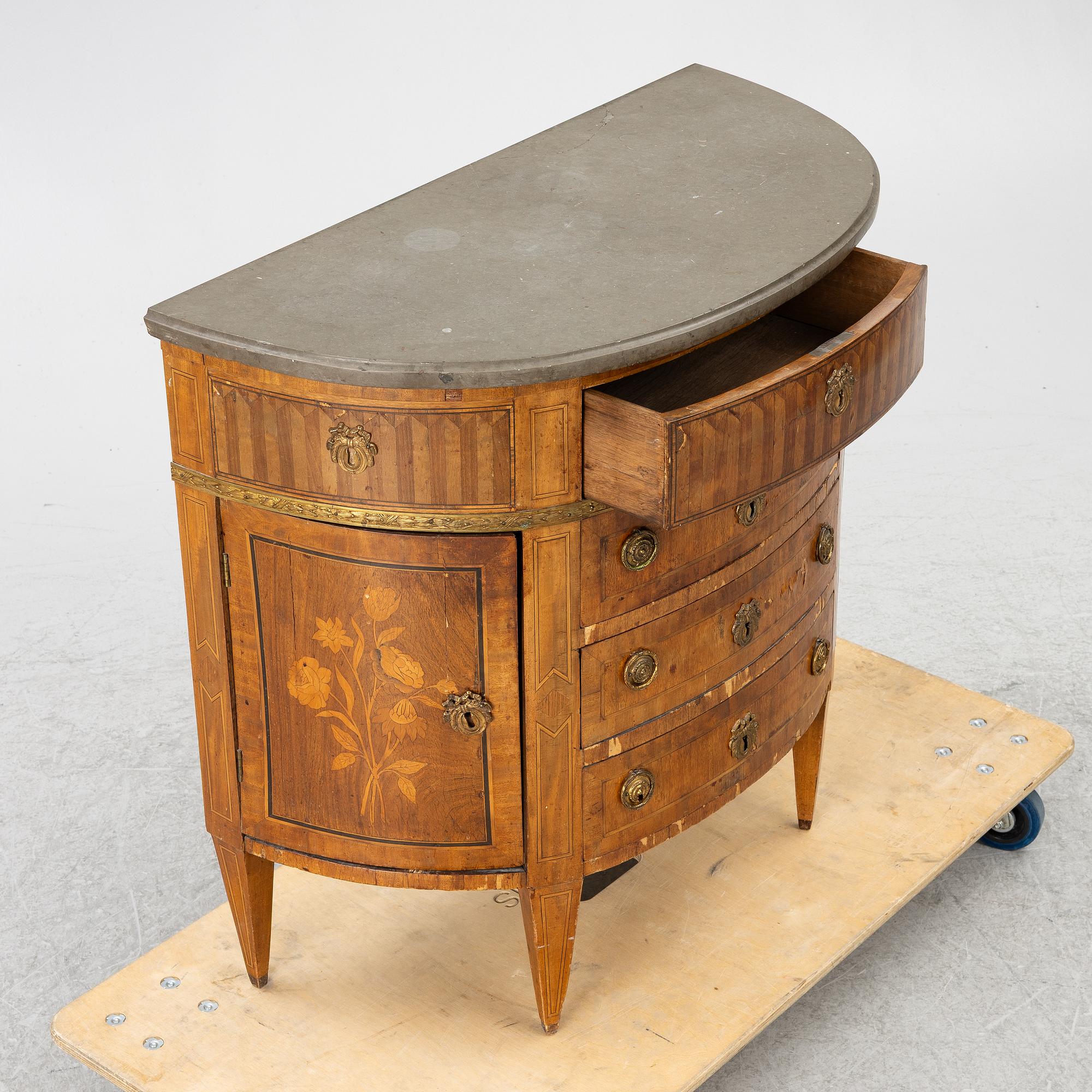 A Louis XVI style chest of drawers, 19th century.