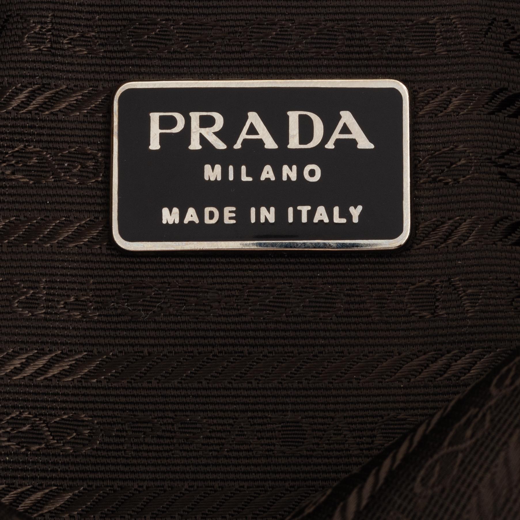 Prada, a tan suede bag.