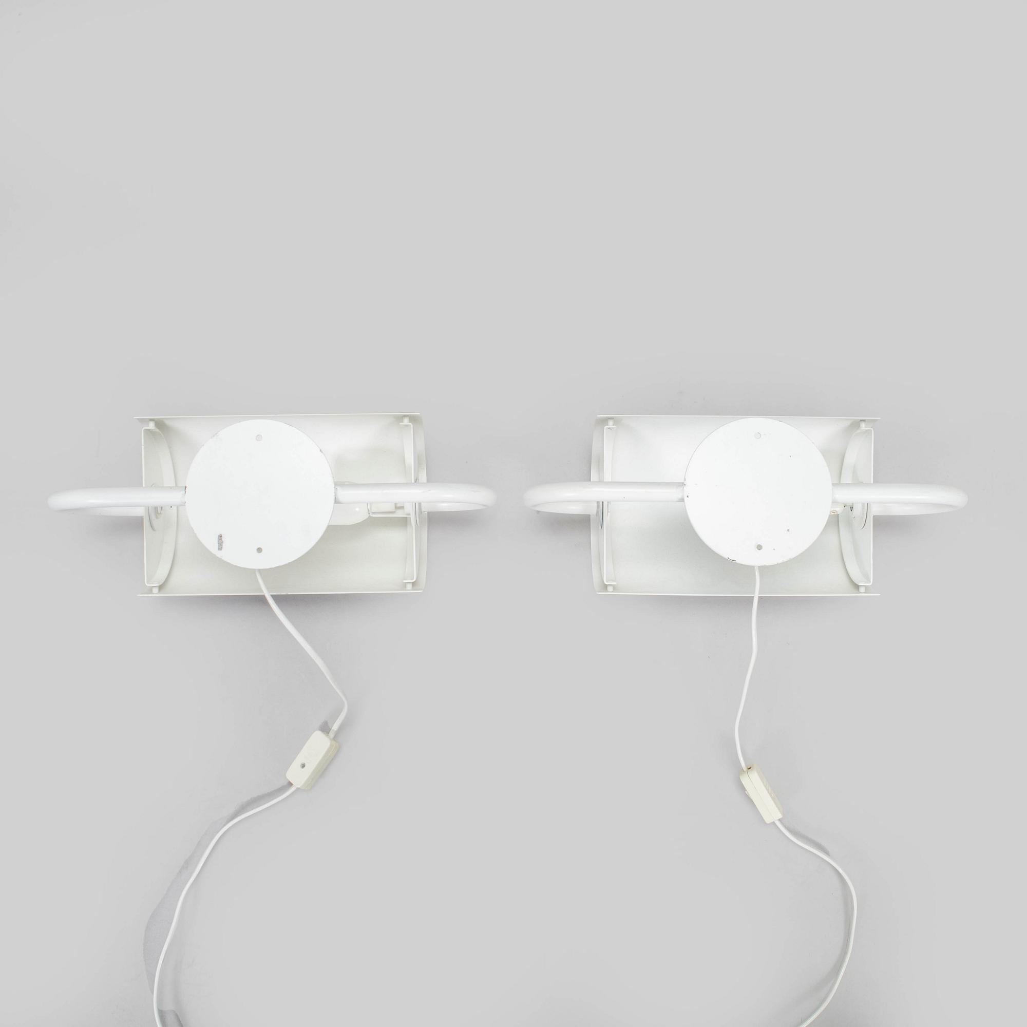 Ben af Schultén, A pair of 1970s "BS 912" wall lights by Metallimestarit for Artek Finland.