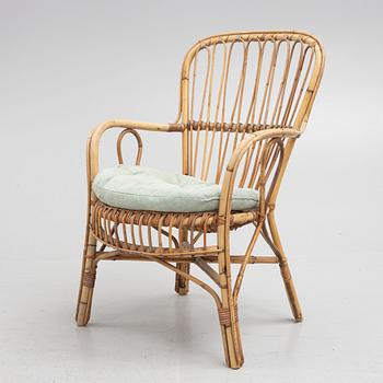 A wicker chair, mid 20th century.