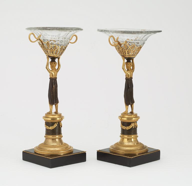 A pair of Austrian Empire early 19th century centre pieces.