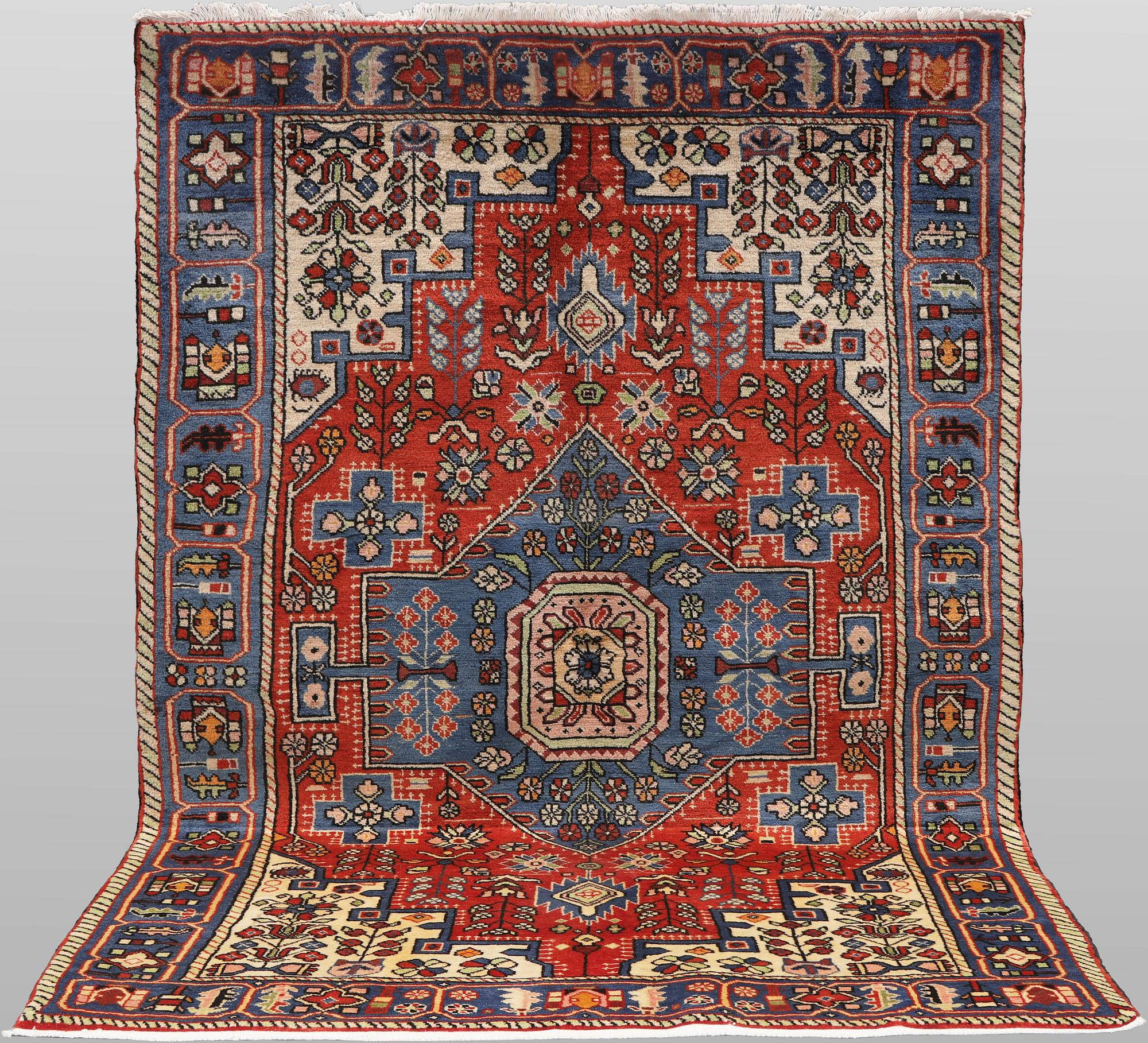 A Hamadan rug, 213 x 138 cm.