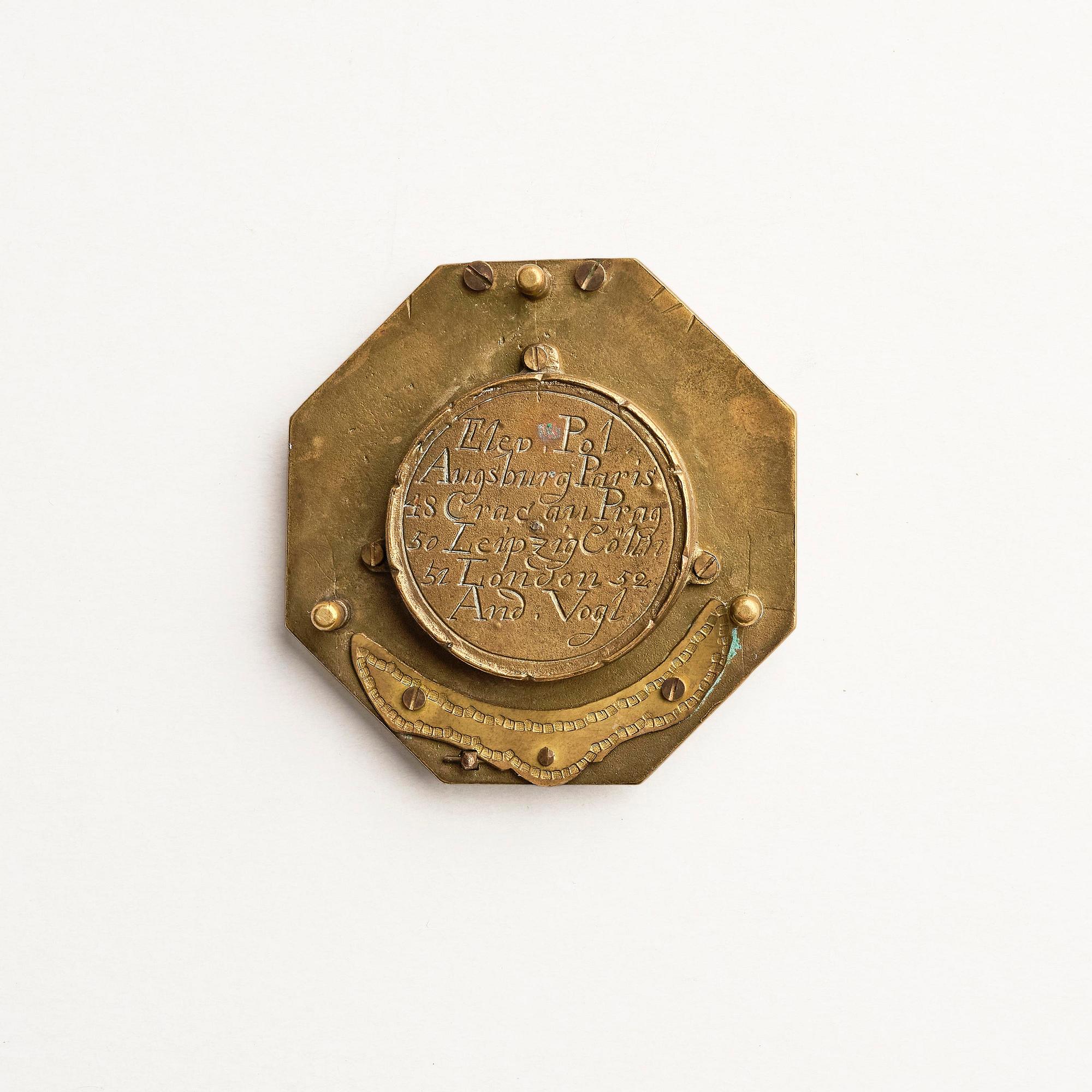 An engraved brass octagonal equinoctial compass sundial by Andreas Vogler (Augsburg, c. 1766-90).
