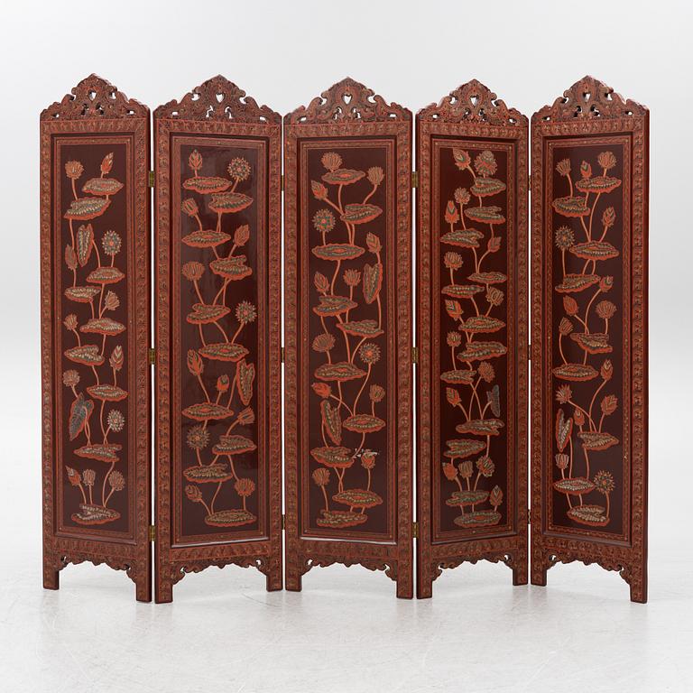 A folding screen, south east Asia, second half of the 20th century.