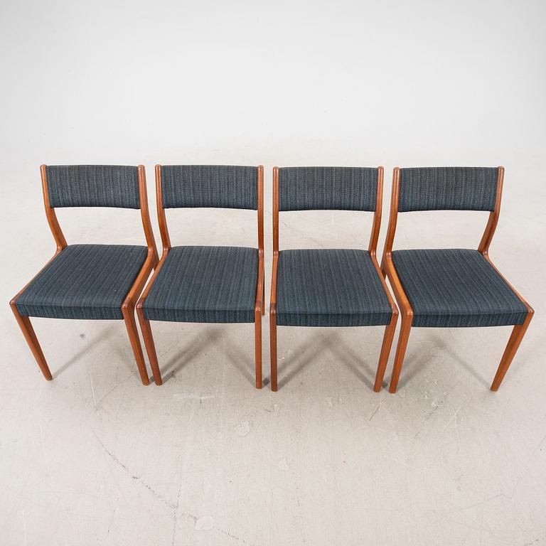 A set of four 1960s teak chairs.