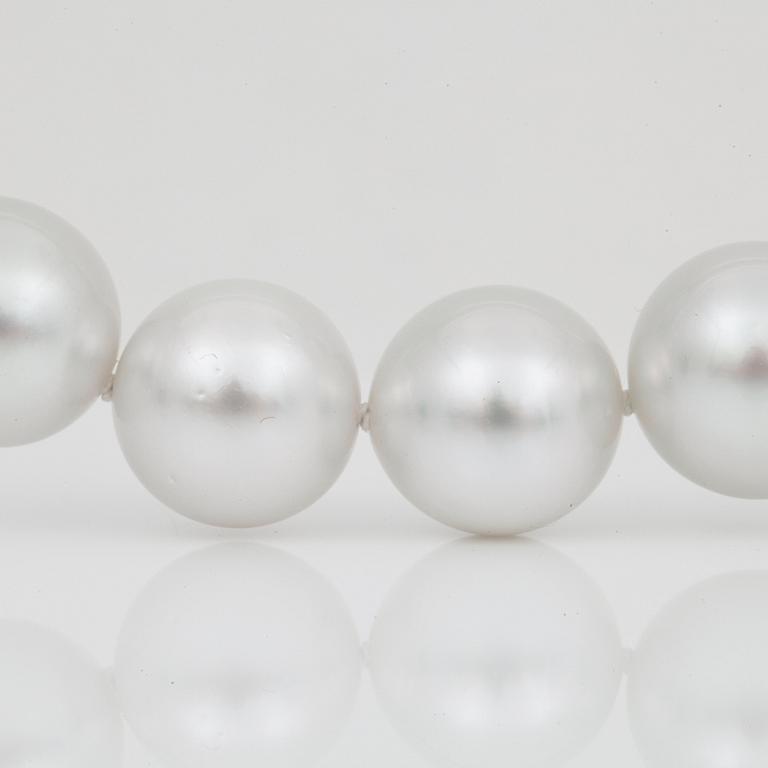 A cultured South Sea pearl necklace, Ø 12-14 mm, with a diamond-set clasp.