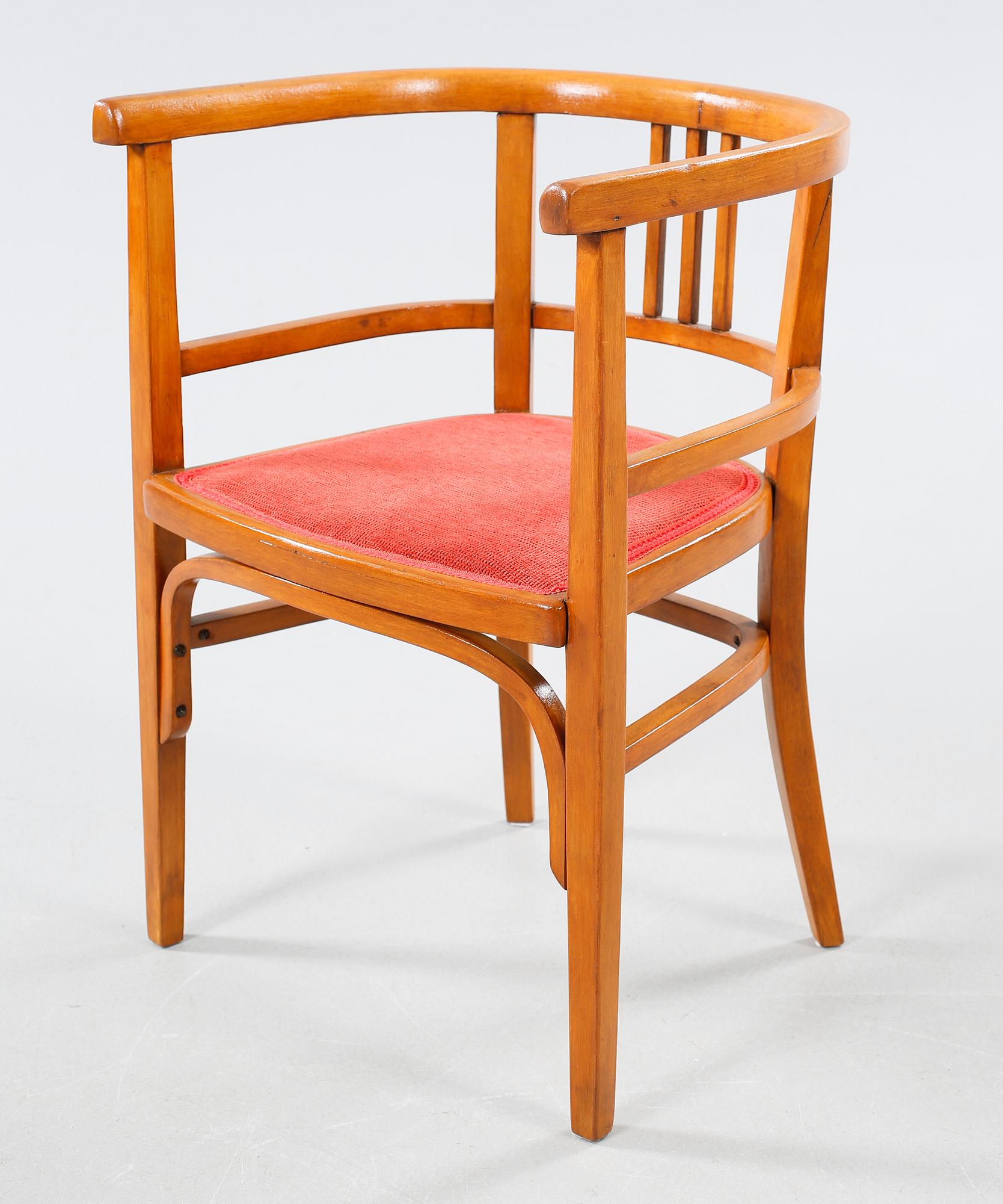A table and a arm chair from the second quarter of the 20th century.