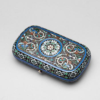 167. A Russian late 19th century silver-gilt and enamel cigarette-case, mark of Ovchinnikov, Moscow.