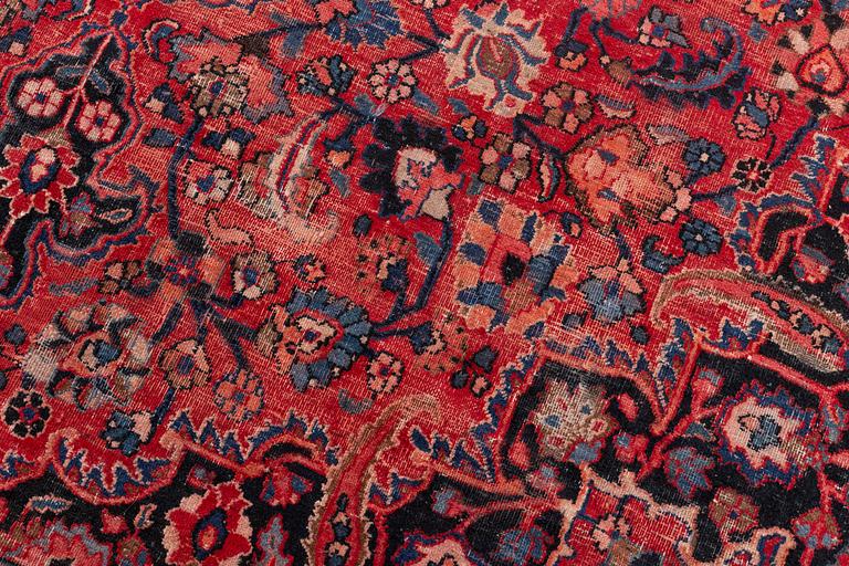 An oriental carpet, c. 401 x 295 cm.