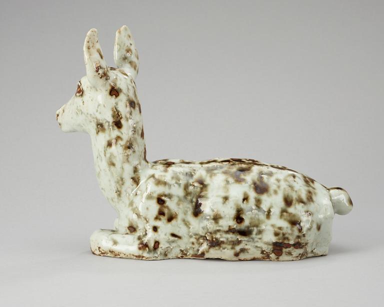 A Michael Schilkin stoneware sculpture of a deer, Arabia.